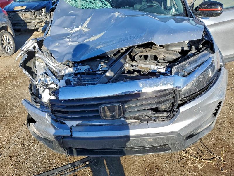 Photo 11 from auction – 2021 HONDA RIDGELINE with VIN 5FPYK3F14MB009989