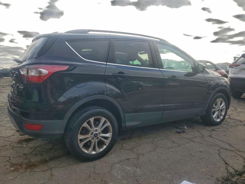 Photo 3 from auction – 2018 FORD ESCAPE SE with VIN 1FMCU0GD1JUA43651