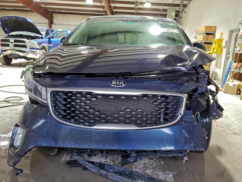 Photo 5 from auction – 2015 KIA SEDONA with VIN KNDMC5C17F6065671