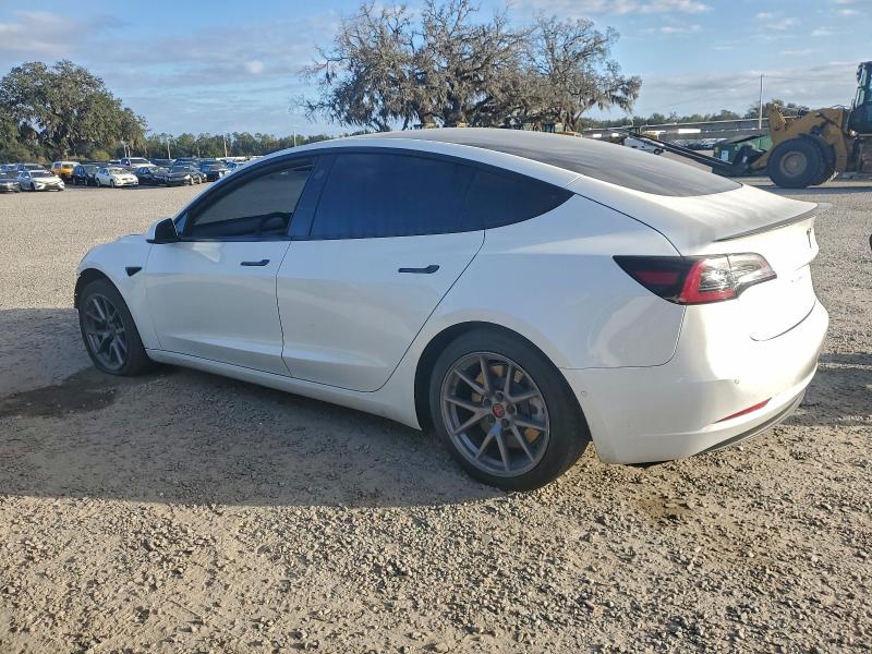 Photo 2 from auction – 2022 TESLA MODEL 3 with VIN 5YJ3E1EB8NF105098