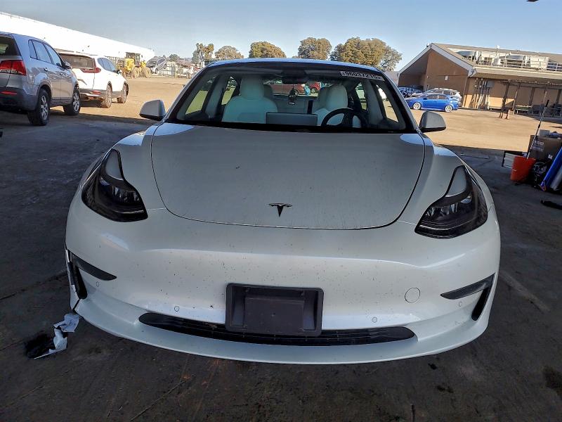 Photo 5 from auction – 2021 TESLA MODEL 3 with VIN 5YJ3E1EA3MF000667