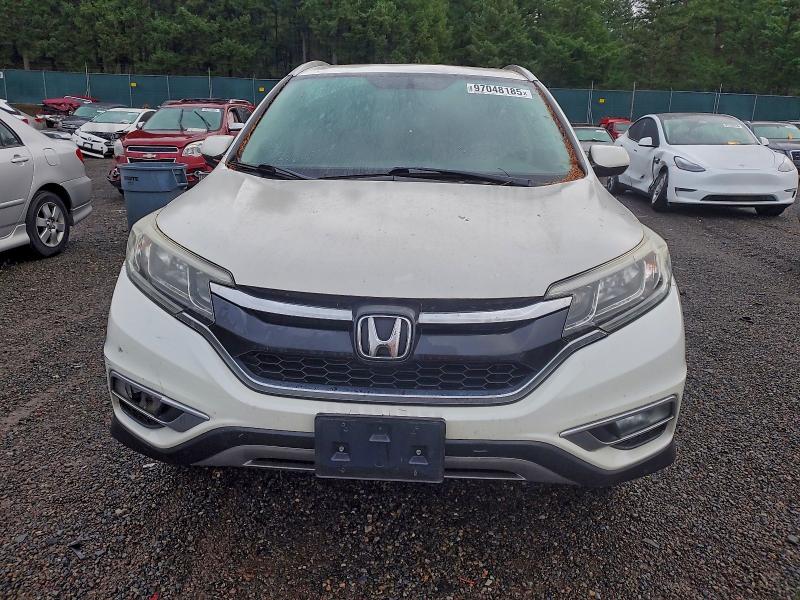Photo 5 from auction – 2015 HONDA CR-V EXL with VIN 5J6RM4H73FL011869
