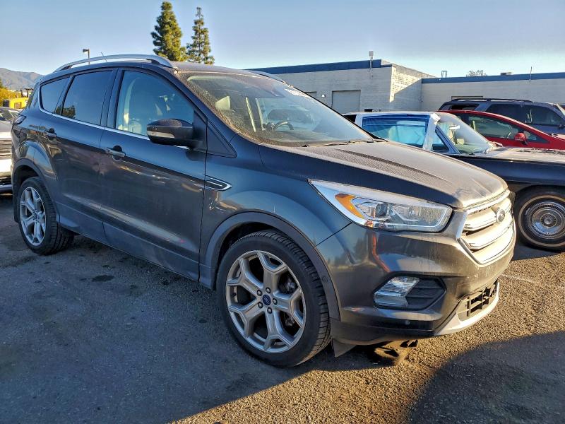 Photo 4 from auction – 2017 FORD ESCAPE TIT with VIN 1FMCU9J96HUD32947