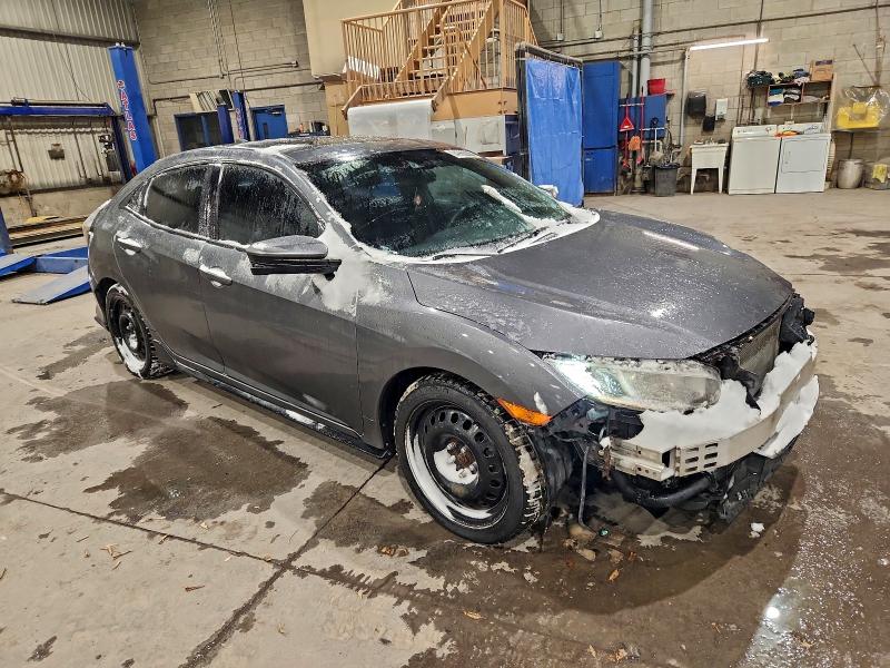 Photo 4 from auction – 2017 HONDA CIVIC with VIN SHHFK7H4XHU307062