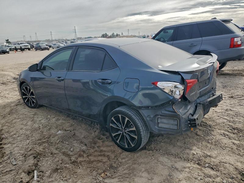 Photo 2 from auction – 2018 TOYOTA COROLLA L with VIN 5YFBURHE3JP838256