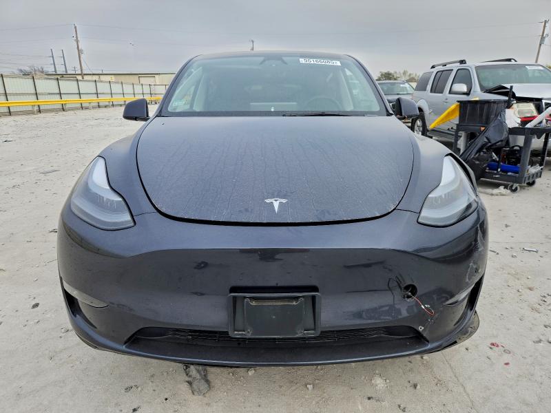 Photo 5 from auction – 2025 TESLA MODEL Y with VIN 7SAYGDEE6SA347640