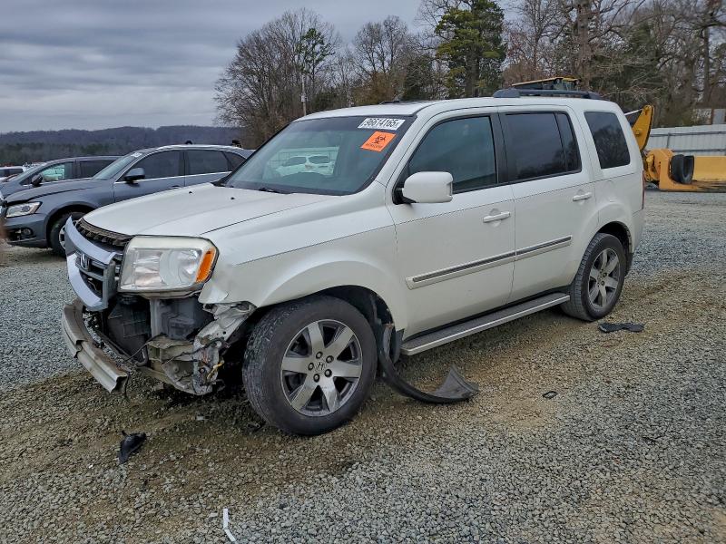 HONDA PILOT TOUR 2015 with VIN 5FNYF4H96FB047426 - Photo from auction