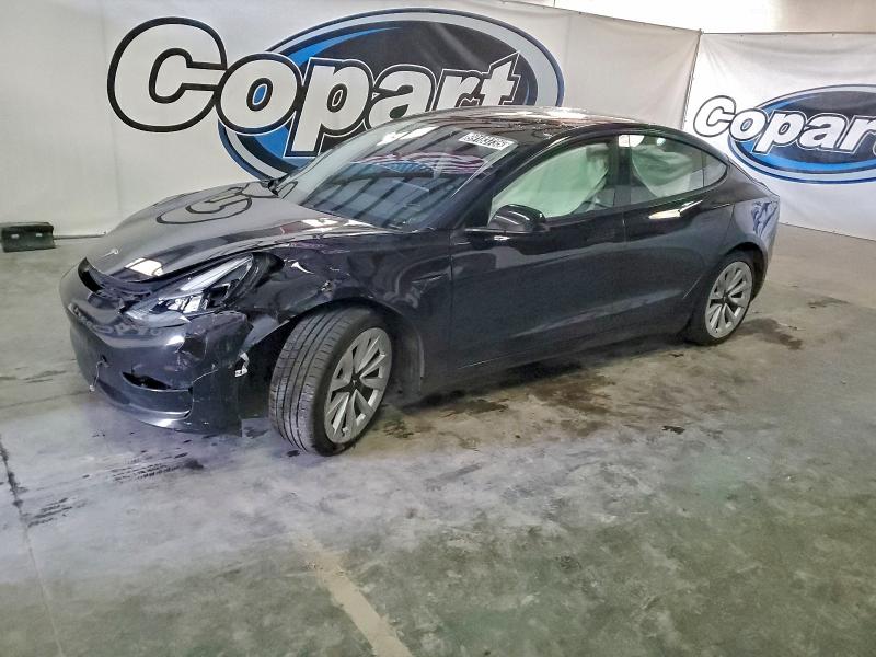TESLA MODEL 3 2022 with VIN 5YJ3E1EA4NF304057 - Photo from auction