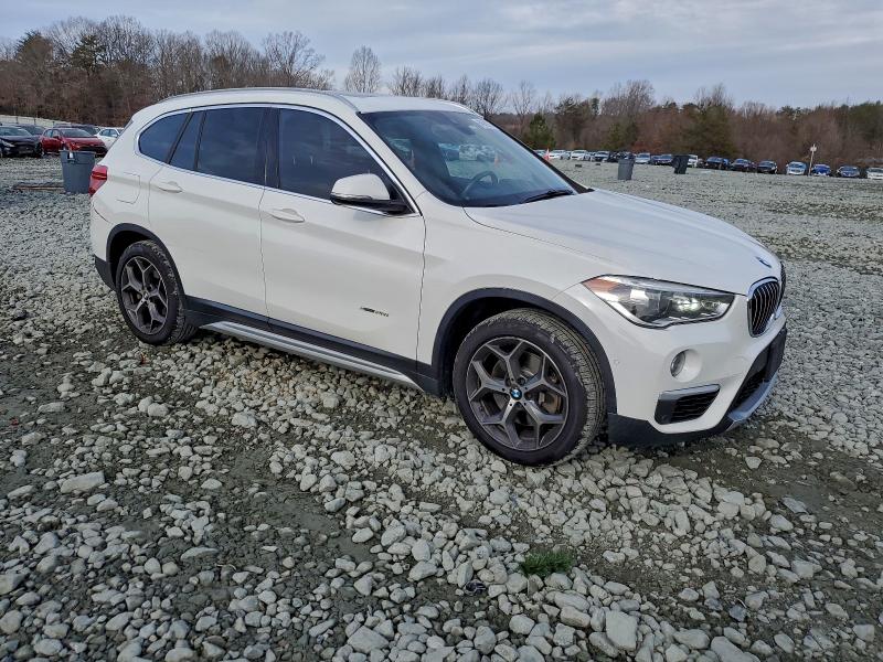 Photo 4 from auction – 2017 BMW X1 XDRIVE2 with VIN WBXHT3Z3XH4A54912