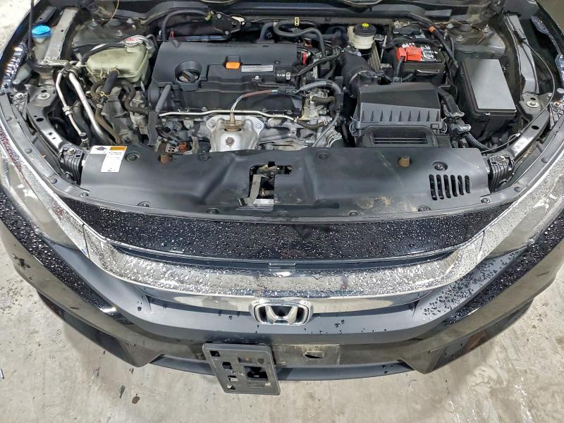 Photo 11 from auction – 2018 HONDA CIVIC LX with VIN 2HGFC2F58JH595503
