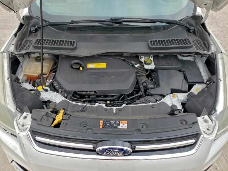 Photo 12 from auction – 2015 FORD ESCAPE with VIN 1FMCU0JXXFUC04184