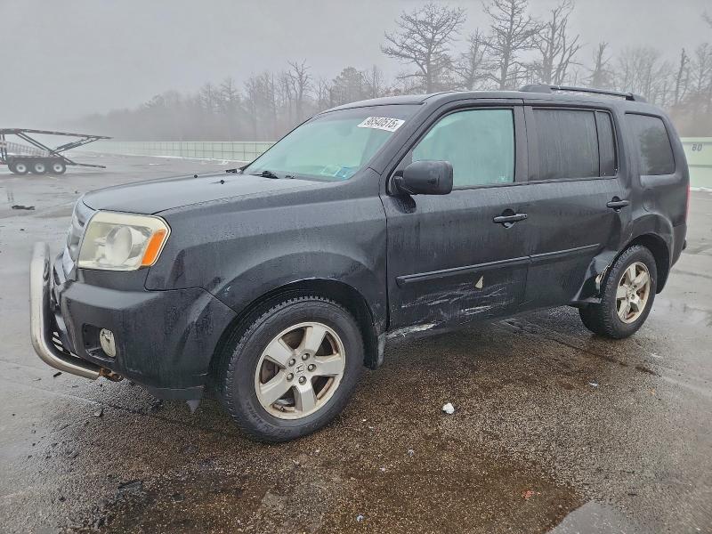 HONDA PILOT EXL 2011 with VIN 5FNYF4H59BB073736 - Photo from auction