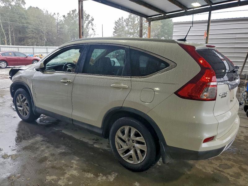 Photo 2 from auction – 2016 HONDA CR-V with VIN 5J6RM3H78GL010499