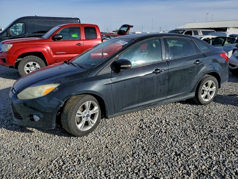 FORD FOCUS SE 2014 with VIN 1FADP3F23EL392104 - Photo from auction