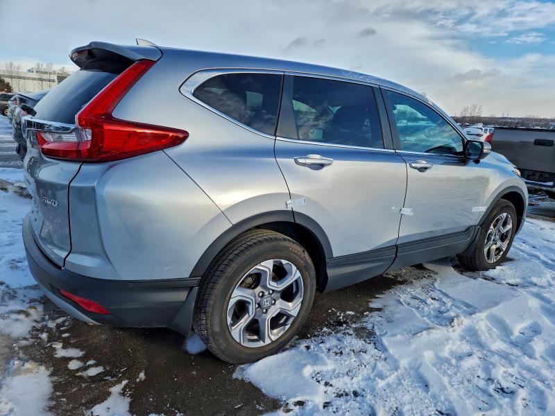 Photo 3 from auction – 2017 HONDA CR-V EX with VIN 2HKRW2H57HH103643
