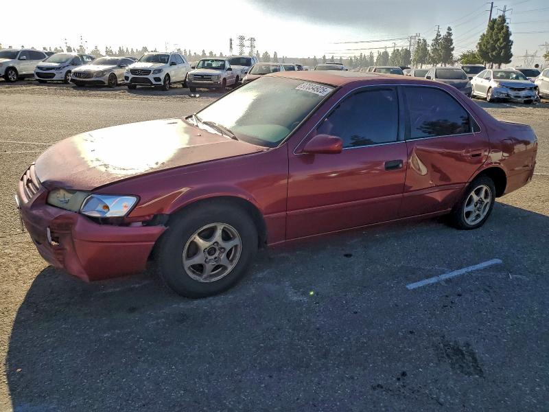 TOYOTA CAMRY LE 1997 with VIN JT2BG22K7V0050182 - Photo from auction