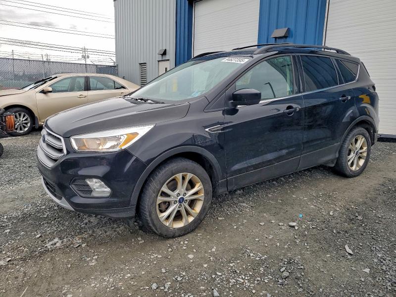 FORD ESCAPE SE 2017 with VIN 1FMCU9GD5HUD89443 - Photo from auction