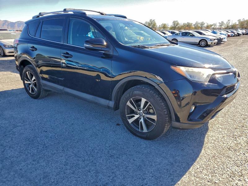 Photo 4 from auction – 2017 TOYOTA RAV4 XLE with VIN 2T3WFREV0HW345330
