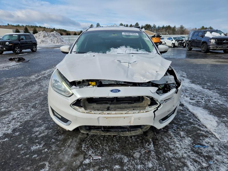 Photo 5 from auction – 2016 FORD FOCUS SEDAN with VIN 1FADP3J22GL247968