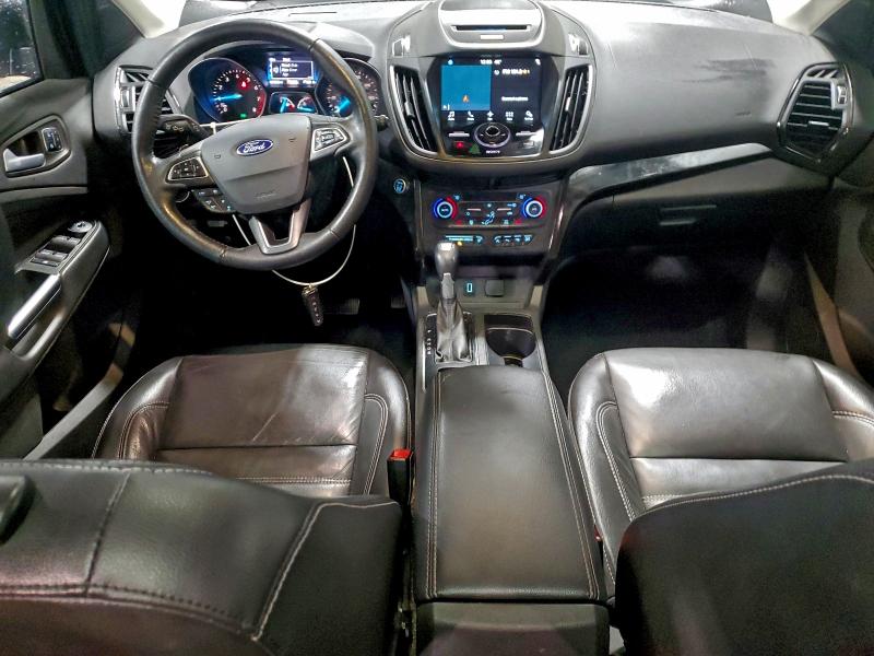Photo 8 from auction – 2018 FORD ESCAPE TIT with VIN 1FMCU9J98JUA31134