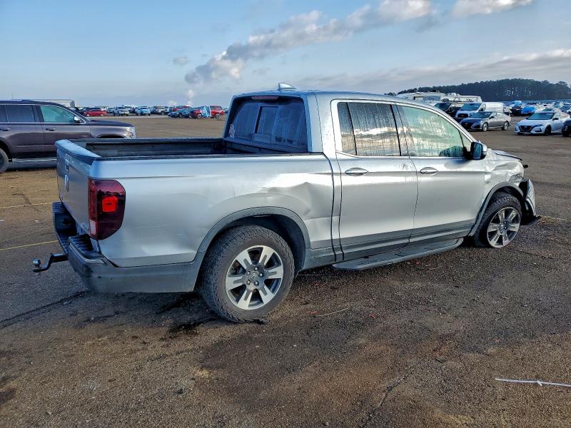 Photo 3 from auction – 2017 HONDA RIDGELINE with VIN 5FPYK3F77HB024674