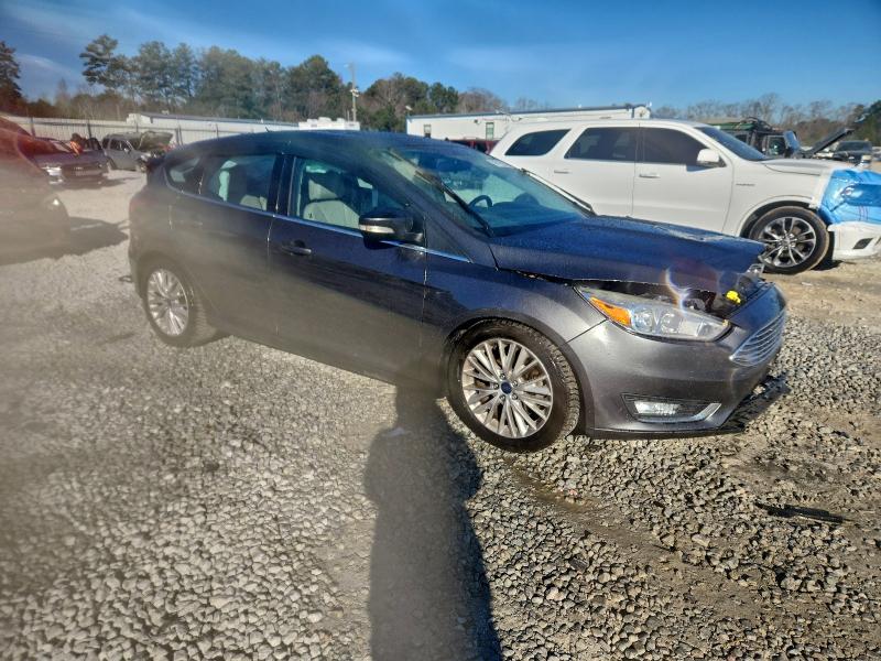 Photo 4 from auction – 2015 FORD FOCUS TITA with VIN 1FADP3N27FL386633