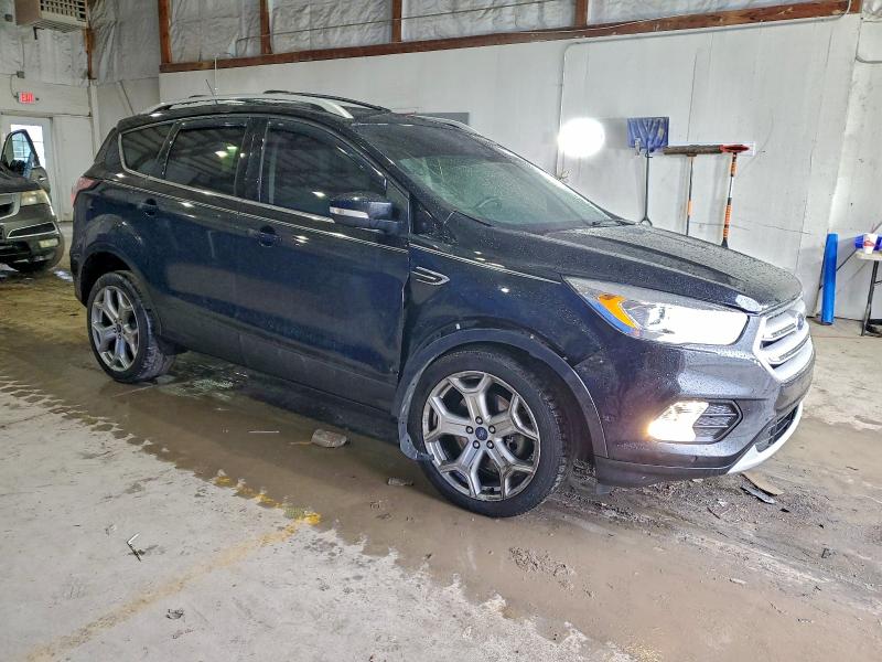 Photo 4 from auction – 2018 FORD ESCAPE TIT with VIN 1FMCU9J98JUB69126