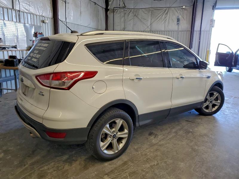 Photo 3 from auction – 2014 FORD ESCAPE SE with VIN 1FMCU9GXXEUD59571