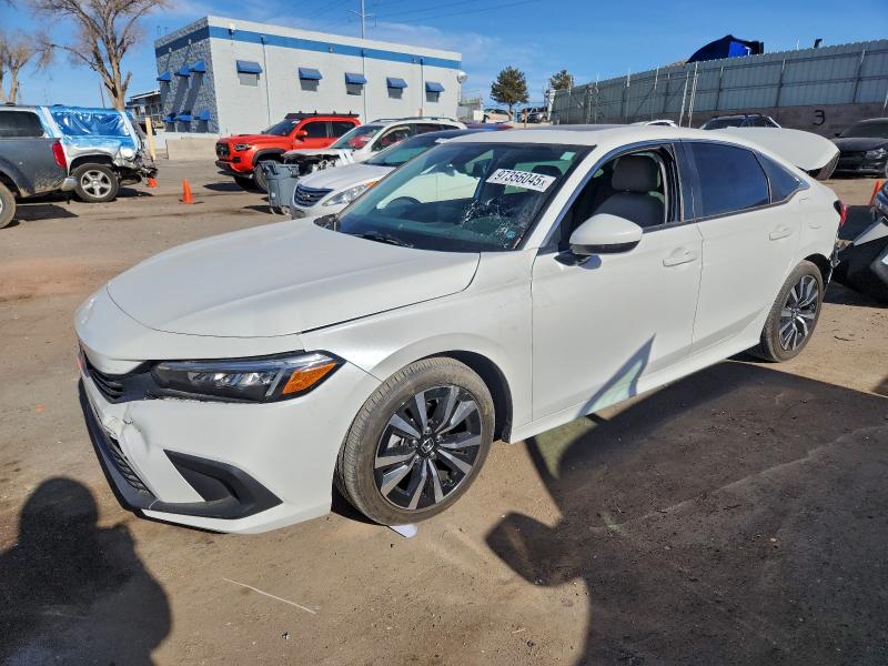 HONDA CIVIC EX 2023 with VIN 2HGFE1F79PH309477 - Photo from auction
