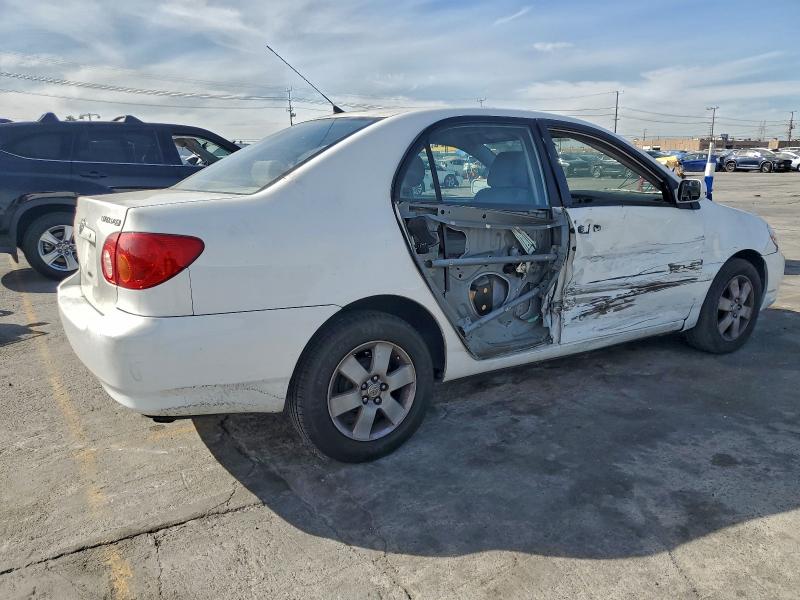 Photo 3 from auction – 2003 TOYOTA COROLLA CE with VIN JTDBR32E030031388