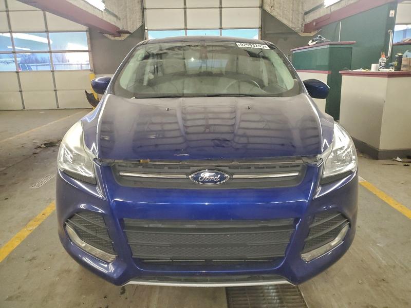 Photo 5 from auction – 2016 FORD ESCAPE with VIN 1FMCU9GX2GUA18748