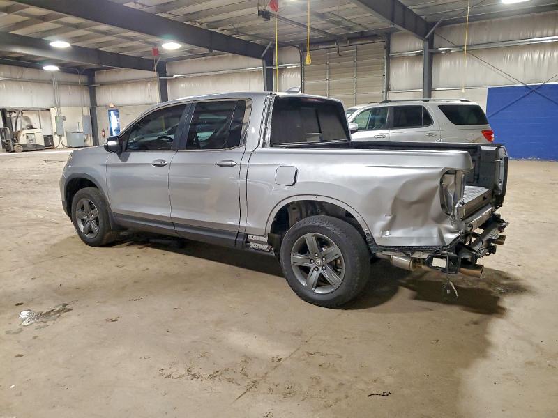 Photo 2 from auction – 2023 HONDA RIDGELINE with VIN 5FPYK3F57PB021867