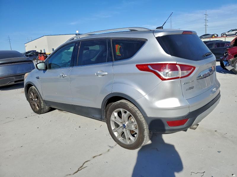 Photo 2 from auction – 2014 FORD ESCAPE TIT with VIN 1FMCU9JX2EUA33658