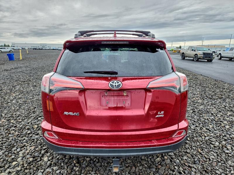 Photo 6 from auction – 2018 TOYOTA RAV4 LE with VIN 2T3BFREV7JW853184