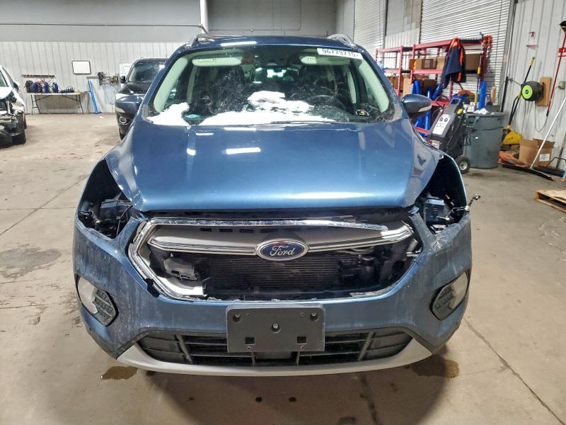 Photo 5 from auction – 2018 FORD ESCAPE TIT with VIN 1FMCU9J95JUC35552