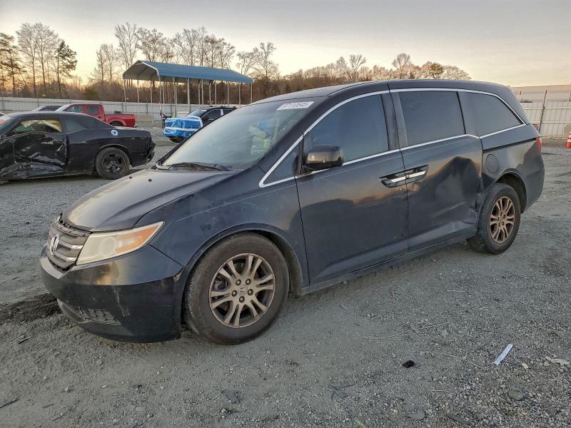 HONDA ODYSSEY EX 2011 with VIN 5FNRL5H67BB101058 - Photo from auction