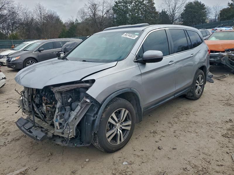 HONDA PILOT EXL 2016 with VIN 5FNYF5H5XGB012442 - Photo from auction