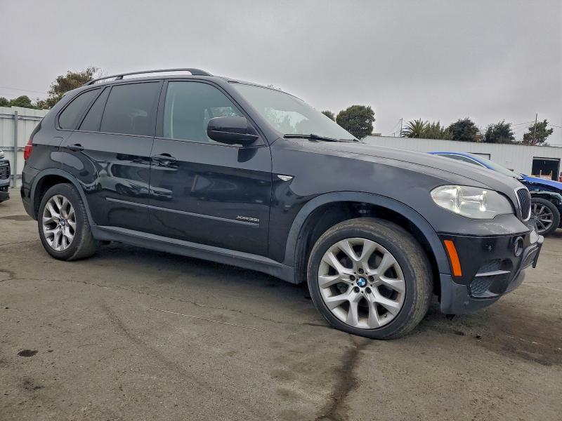 Photo 4 from auction – 2013 BMW X5 XDRIVE3 with VIN 5UXZV4C55D0E11019