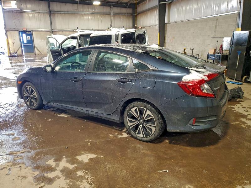 Photo 2 from auction – 2016 HONDA CIVIC EXL with VIN 19XFC1F73GE200304