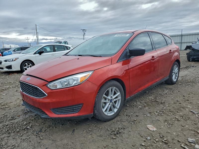 FORD FOCUS SE 2018 with VIN 1FADP3K23JL299051 - Photo from auction