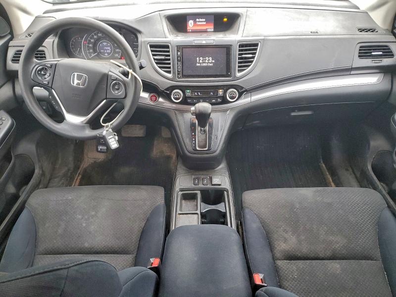 Photo 8 from auction – 2015 HONDA CR-V with VIN 2HKRM4H55FH127941