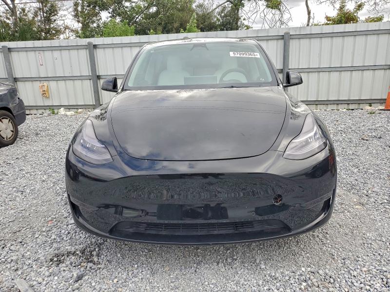 Photo 5 from auction – 2022 TESLA MODEL Y with VIN 7SAYGAEEXNF416819