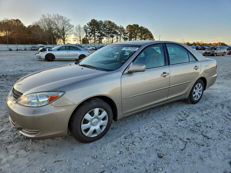 TOYOTA CAMRY LE 2003 with VIN 4T1BE32K43U673358 - Photo from auction