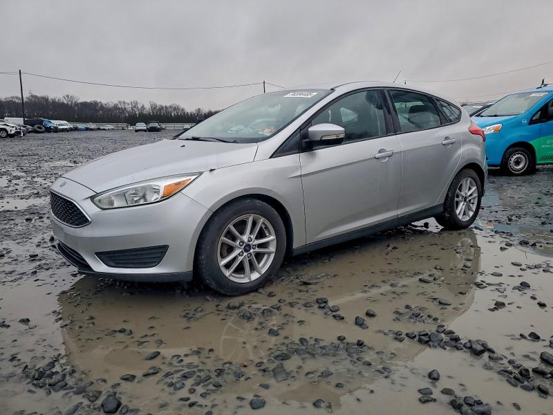 FORD FOCUS SE 2017 with VIN 1FADP3K20HL216041 - Photo from auction