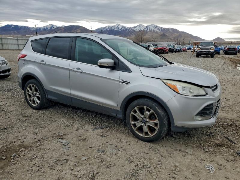 Photo 4 from auction – 2013 FORD ESCAPE with VIN 1FMCU9H95DUD80262