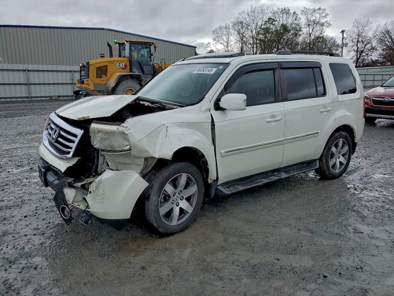 Photo 1 from auction – 2015 HONDA PILOT TOUR with VIN 5FNYF4H95FB001439
