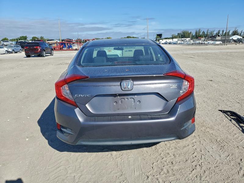 Photo 6 from auction – 2016 HONDA CIVIC LX with VIN 19XFC2F52GE074229