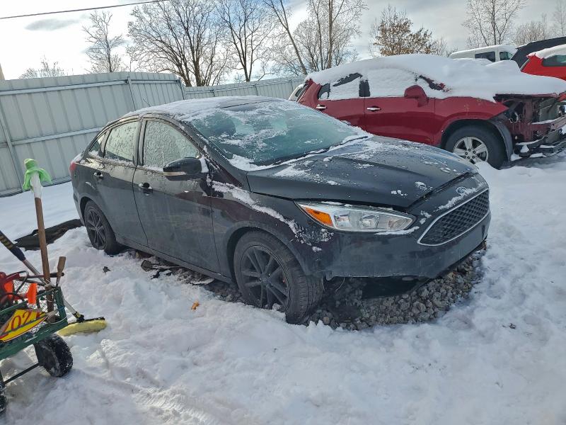 Photo 4 from auction – 2017 FORD FOCUS SE with VIN 1FADP3F27HL205497
