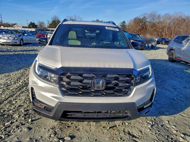 Photo 5 from auction – 2022 HONDA PASSPORT E with VIN 5FNYF8H0XNB010614