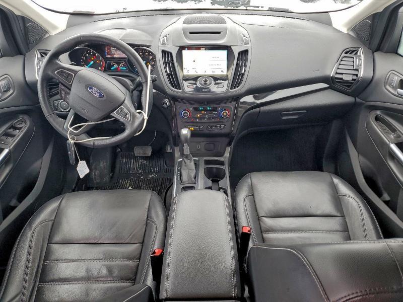 Photo 8 from auction – 2018 FORD ESCAPE TIT with VIN 1FMCU9J94JUC33646